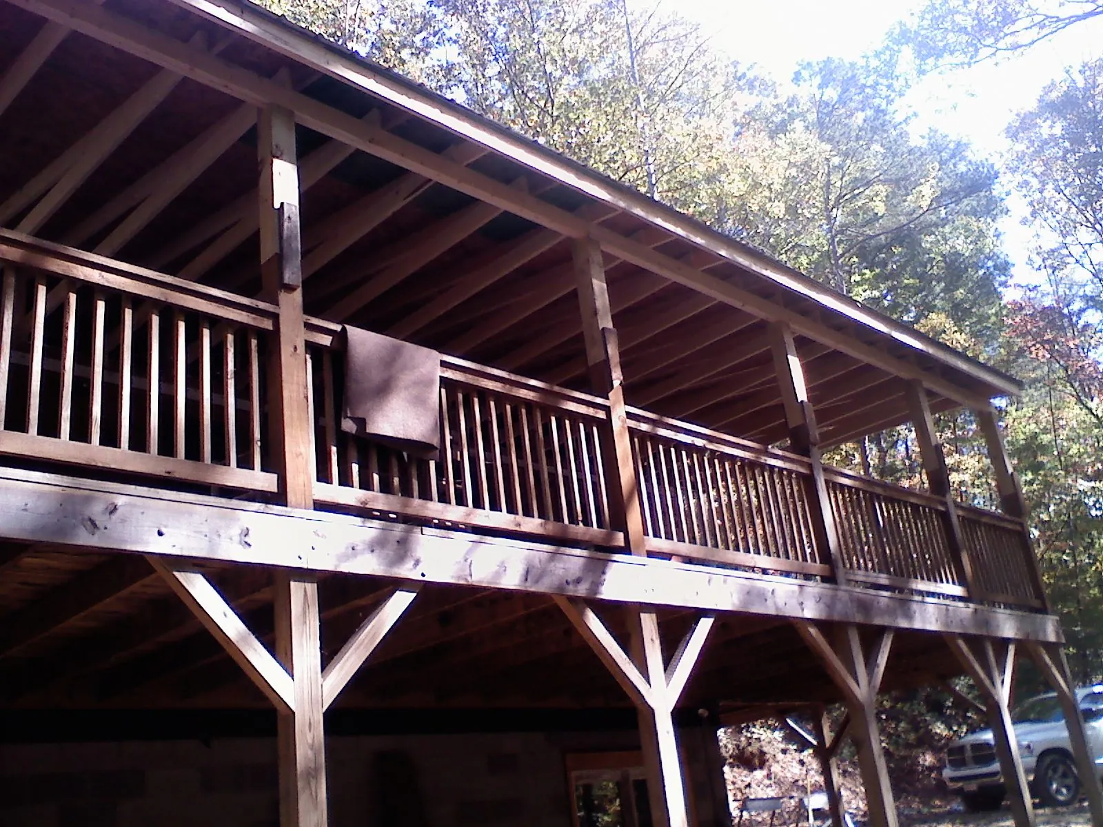 Timber framing under a new elevated porch and deck — Roof Leak Repair in Novi by Roofing Brothers